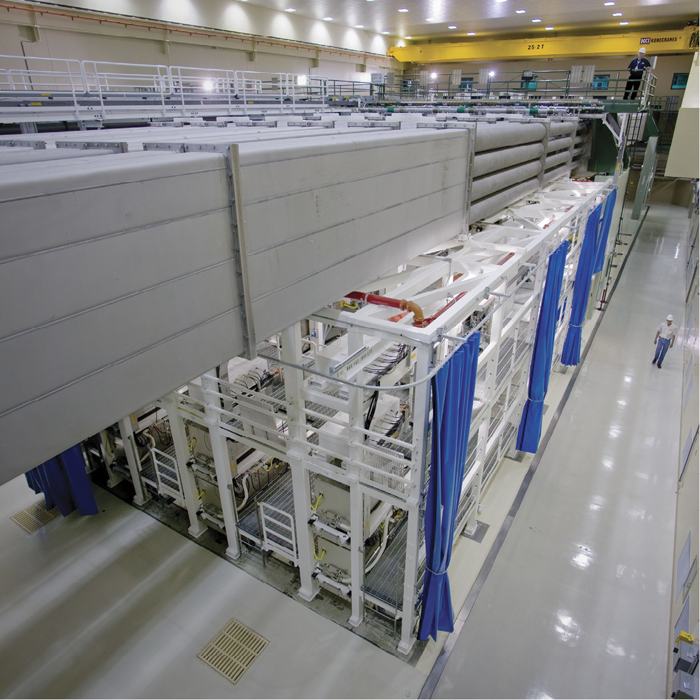 Novel Bragg gratings; side view of Laser Bay 2 shows the four-high laser transport beamline enclosures above the preamplifier support structure. Image NIF.